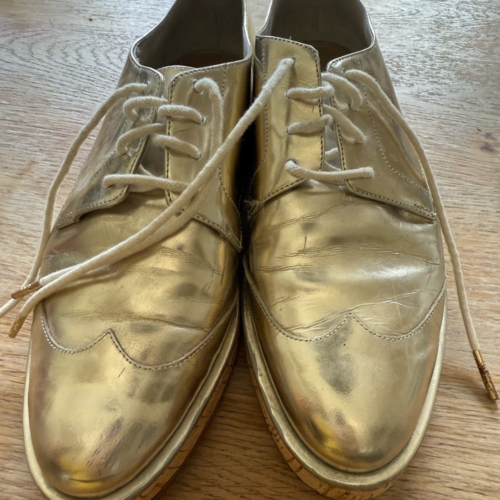 Michael Kors Gold Flats Sleek Design